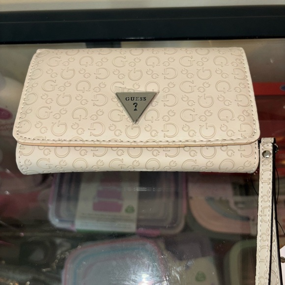 Guess Handbags - GUESS Cream Logo-Embossed Wristlet Wallet
